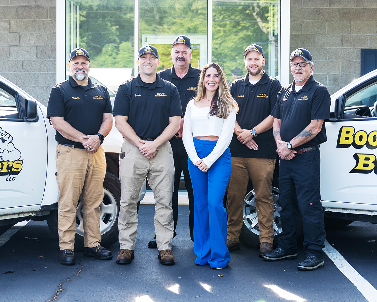 The Boo's Bugstoppers Team in front of their headquarters in Beaver Falls, PA